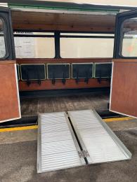 Portable ramp access to accessible carriage 