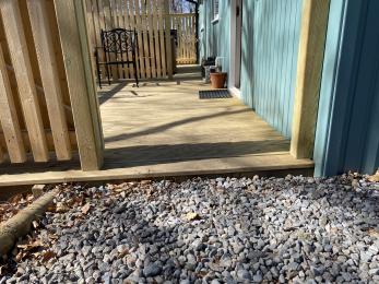 Small step up to lodge decking
