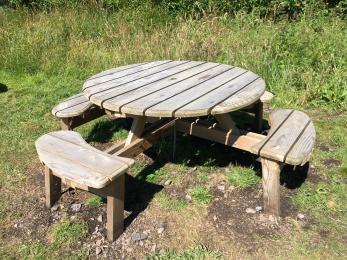 Picnic bench with wheelchair space.