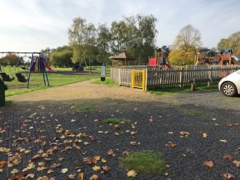 Play area access and hardstanding car parking