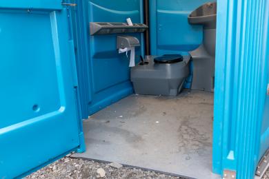 Photo of portaloo showing space from doorway to toilet