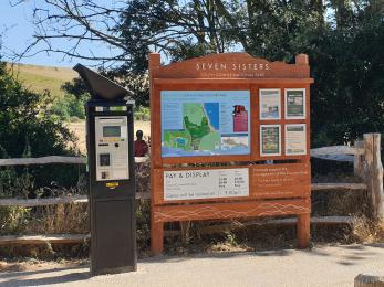 Showing the location of the pay and display machine and information board.