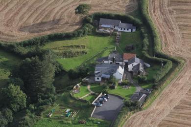 Aerial view of Robin Hill Farm Cottages showing distance from carpark to cottage