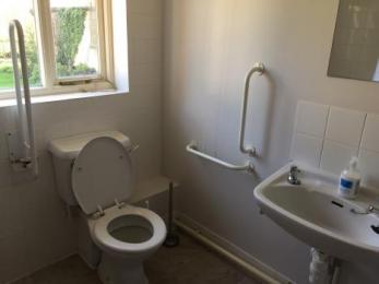 Accessible wet room with hand rails