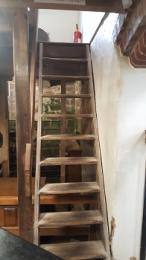 Steep staircase connecting floors in the Mill