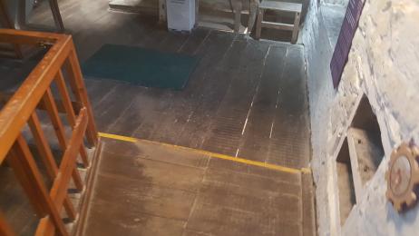 A step in the Mill with yellow marking delineation
