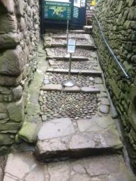 Steps from first landing to kiosk