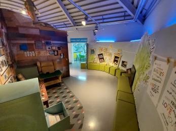 View of the seating area near the replica writing hut in the Story Centre