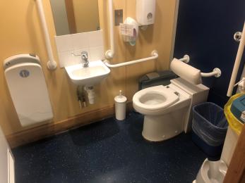 Toilet by entrance