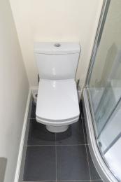 The toilet has access from the front only.