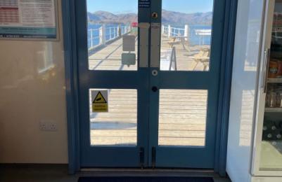 The doorway between the pier and the pier house which has level access