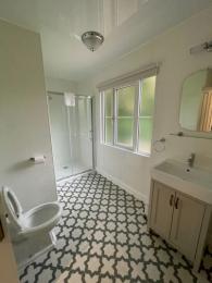Main bathroom in Hilton Cottage, showing the sink, toilet and shower.