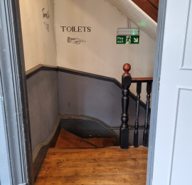 Top view of the stairs to the upstairs function room