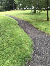 One of the paths in the garden which slopes uphill