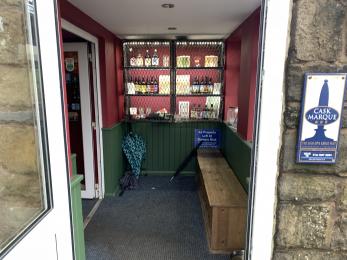 Open front door, into porch, left hand side has double doors opening into the pub.