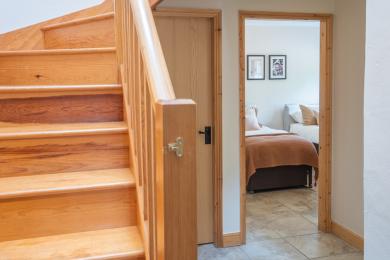 The Byre ground floor showing staircase and entrance to bedroom 2