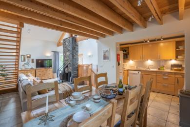 The Byre dining table and kitchen