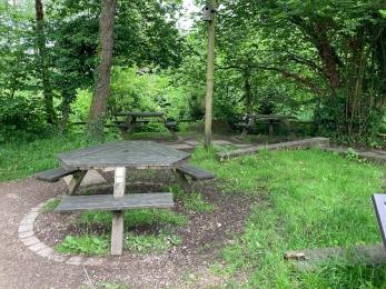 Garden picnic area showing picnic table with space for wheelchair