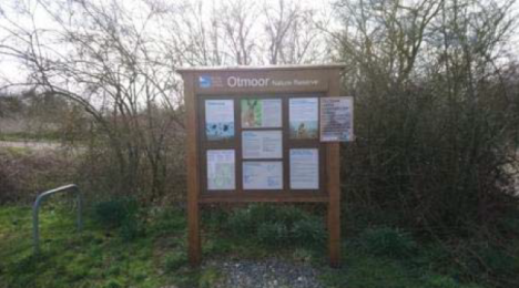 Modular information board in the car park, showing recent sightings and site map