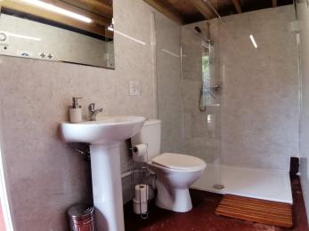 Campsite shower room. Shower with 2 cm high tray.  Toilet and pedastal basin