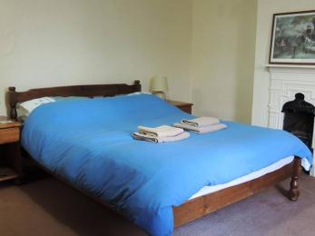double bed with blue bed linen