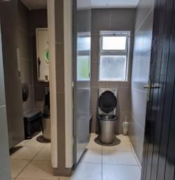 Toilets including baby changing
