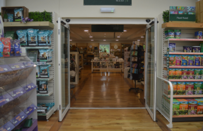 Automatic doors that lead from the garden sundries area back into the main store.