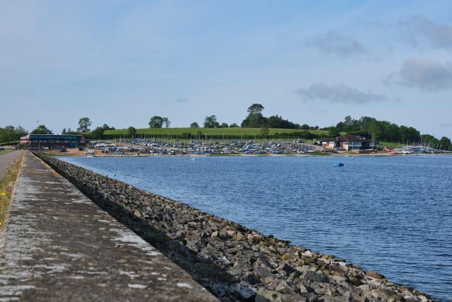 View across the water to the Visitor Hub and Sailing Club