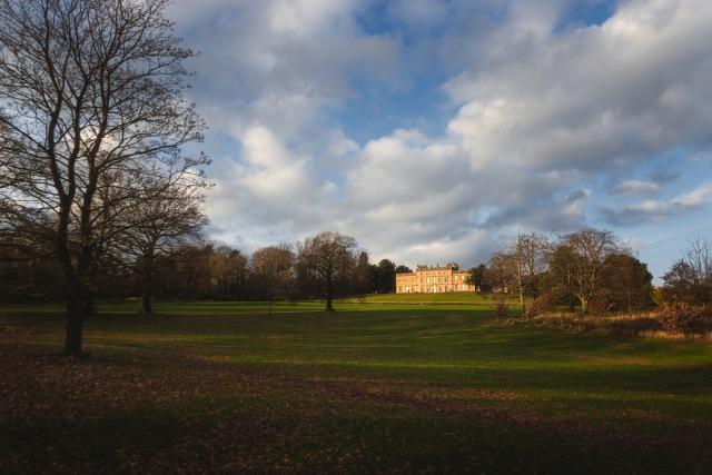 Long distance photo of Cannon Hall set in historic parkland