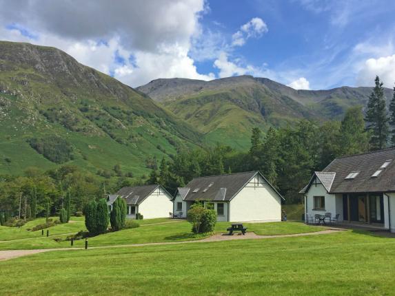 Highland Lodges and front lawns with paths to each Lodge