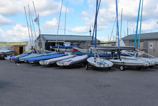 Mylor Sailing and Powerboat School base with sailing boats in the boat park Falmouth Cornwall